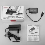 Adapteris USB 3.0 - SATA 6G, matomas iš šono su prijungtu SSD