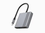Adapteris su USB-C, HDMI ir USB jungtimis, matomas iš šono