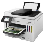 Canon MAXIFY GX7150 spausdintuvas, matomas iš šono, rodo jungčių išdėstymą